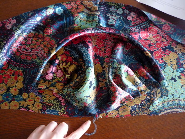 line up shoulder seam to shoulder notch
