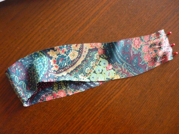 pin neck binding in a loop, right sides together