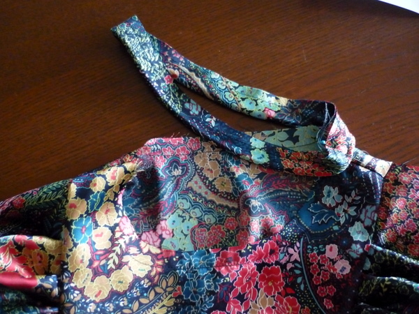 start by pinning binding seam to left shoulder seam