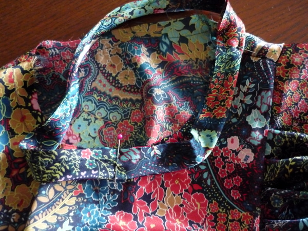 pin along the neckline