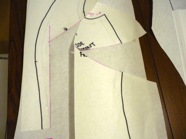 tape down the left side of the opening to the extra paper