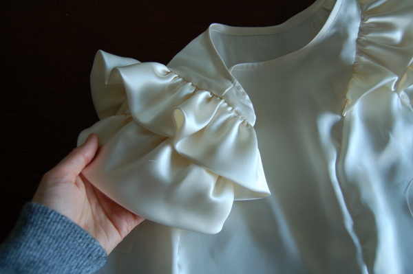 close-up of ruffle sleeve detail