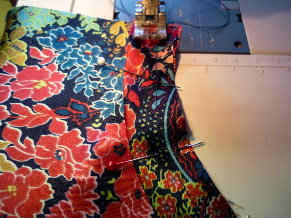 sew armhole binding to armhole