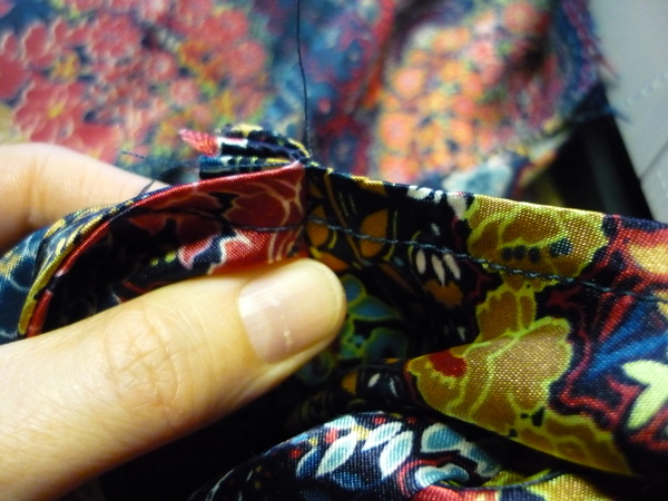 check underarm and make sure the top edge is even