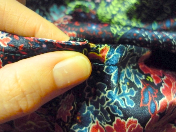 fold seam allowances to the back