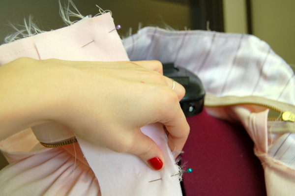 pin placket to front opening, matching notches