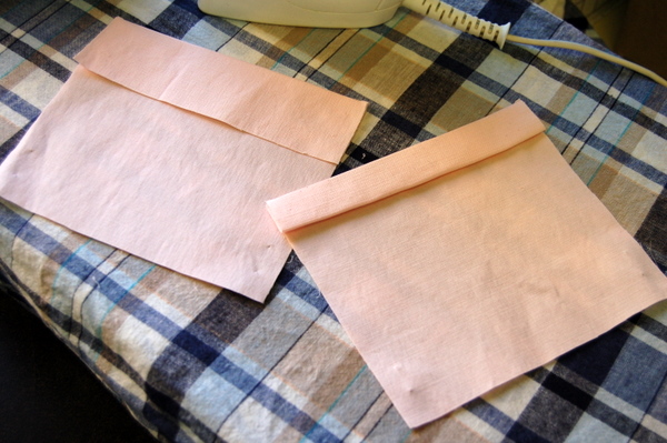 press under hem on top edge of pocket