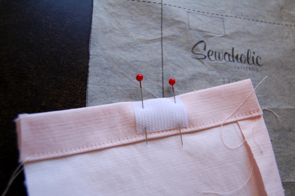 position velcro in the centre of the pocket according to marking