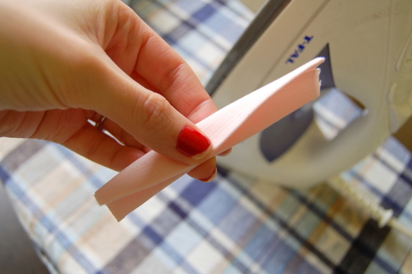 fold loop in half again and press