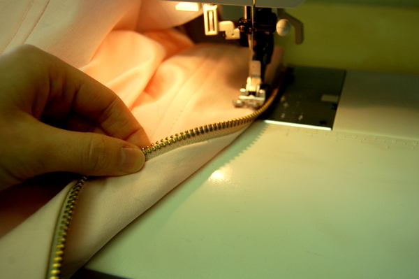 make sure under placket isn't getting caught in topstitching
