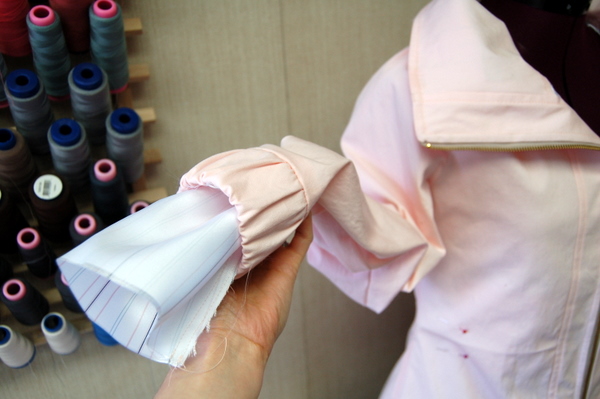 pull the sleeve lining through the jacket sleeve