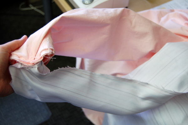 pull out the cuffs from inside the lining