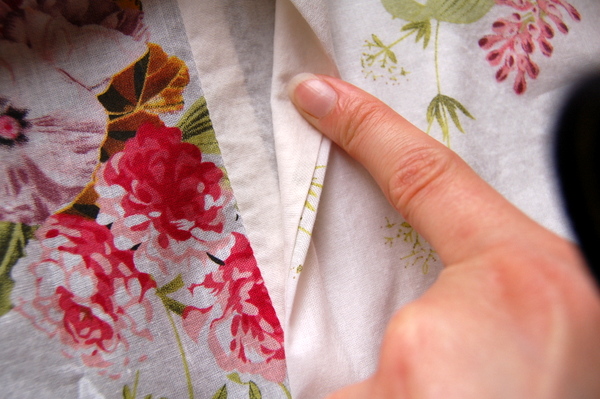 a little bit of fabric, rolled to the inside, helps to hide the pocket lining
