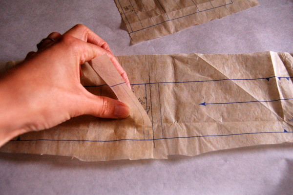 line up centre back seamlines and tape in place